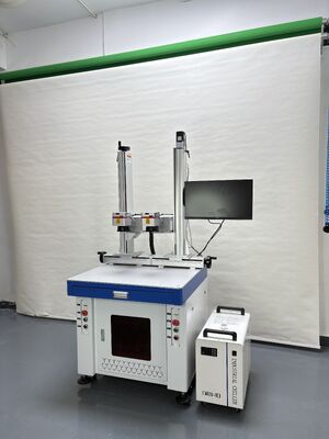 Guter Preis Dual-Head UV Laser Markierungsmaschine mit Dual-Station Synchronisation, 355nm Ultraviolett Laser und industrielle Zuverlässigkeit für Hochgeschwindigkeitsmarkierung Online